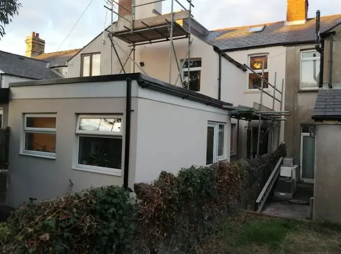 Rear elevation and extension rendered in one colour, all openings beaded